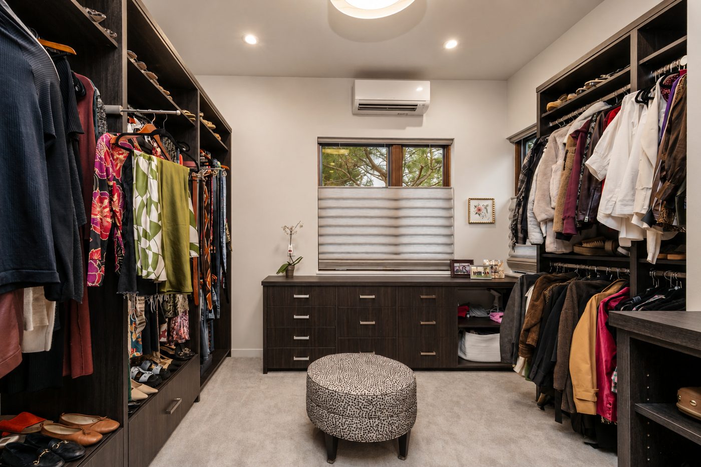 Custom dark textured-laminate walk-in closet and dressing room built in Bend, Oregon