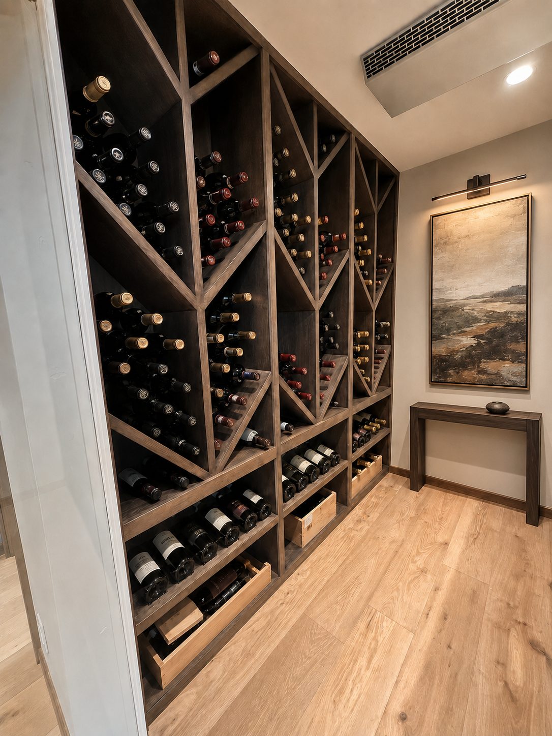 Custom wine cellar with wood wine racking and bottle display in Bend, Oregon by Deschutes River Cabinet & Closet